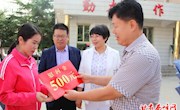 张晓龙教师节前看望慰问我区基层一线教育工作者